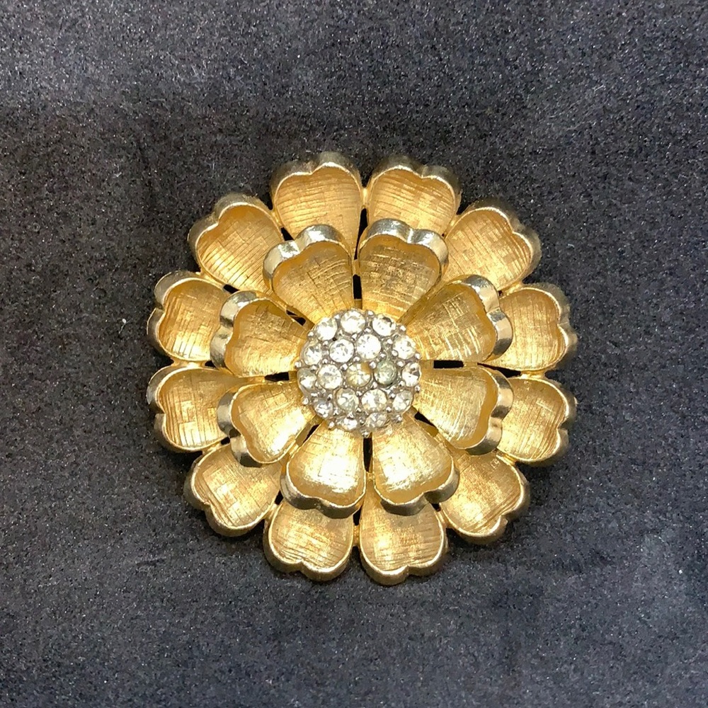 Gold-tone vintage flower brooch with crystals